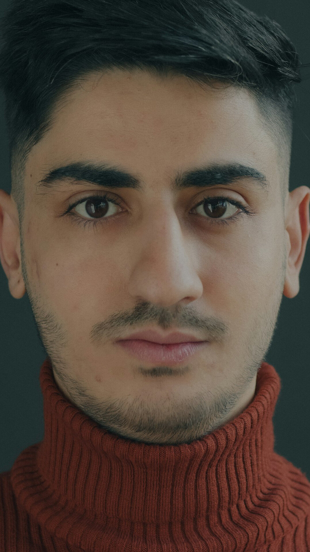 Turkish male broadcast crisis mediator portrait